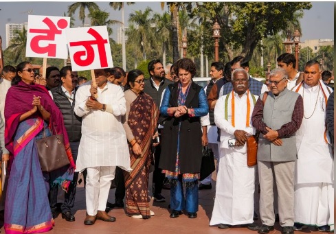 Opposition INDIA Bloc MPs protest in Parliament over bribery charges against business group